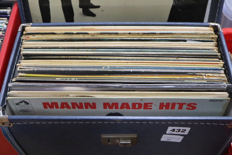 A box of mixed Pop and Rock LPs